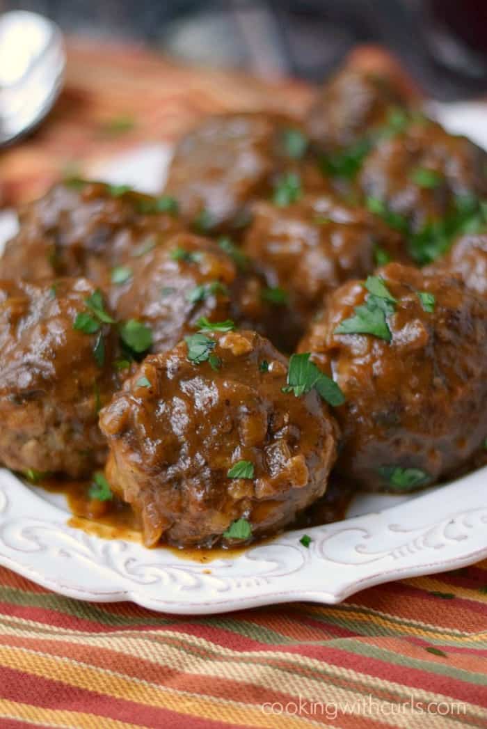 Liege meatballs on a white serving platter.
