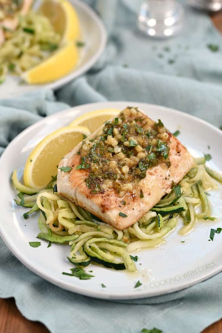 Lemon Garlic topped Mahi Mahi served on a bed of zucchini noodles